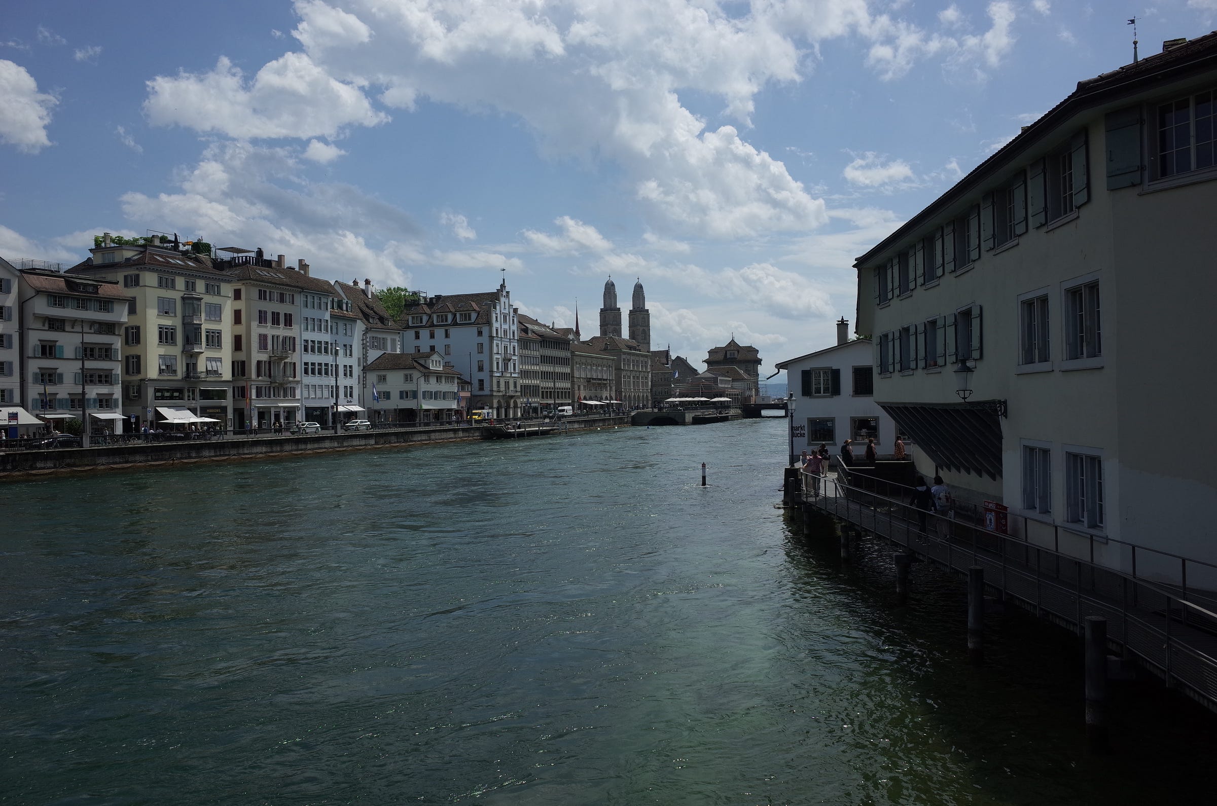 A photograph of the river and Zurich city